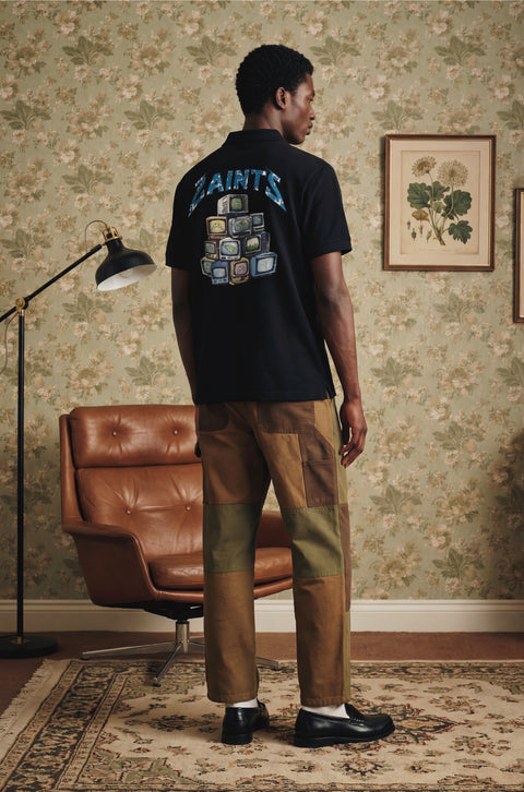 Global saints zip polo